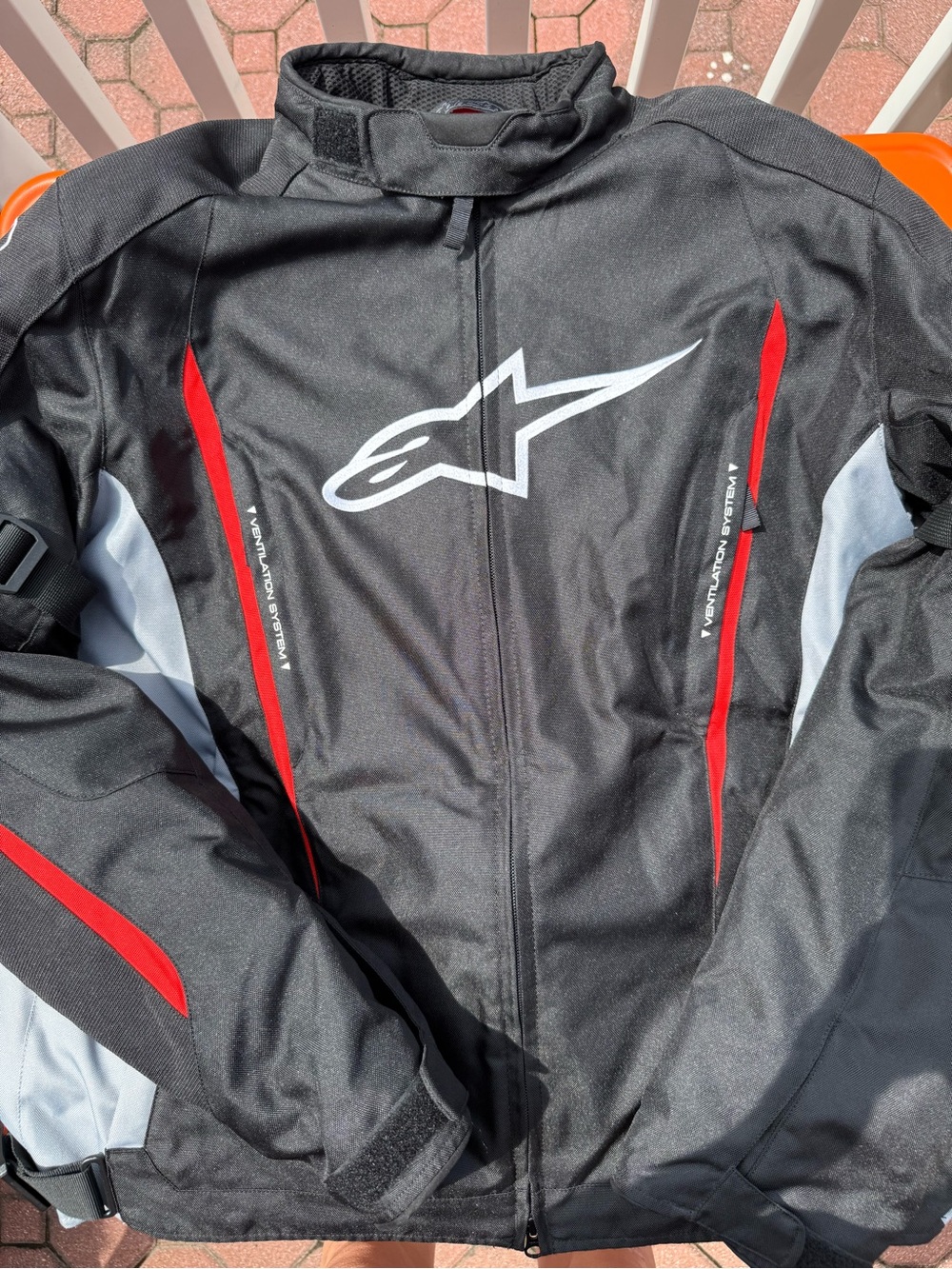 Alpinestars Motorcycle warm Black Jacket with Red & Gray Accents and protection